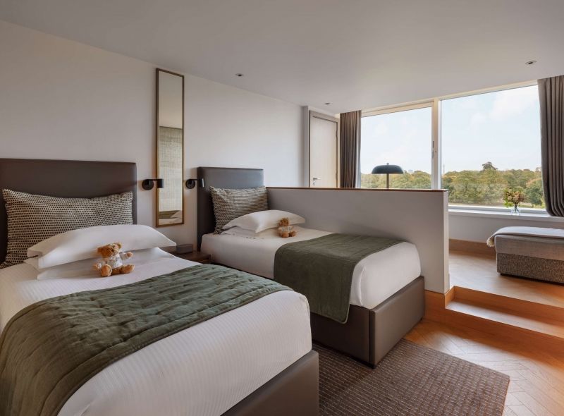 The newly refurbished Garden Deluxe Twin room at Royal Garden Hotel is one of the flagship guest rooms, offering separate twin beds and a stunning view of Kensington Gardens.