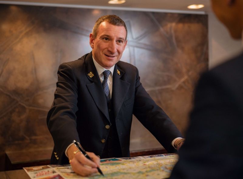 The concierge team member at Royal Garden Hotel.