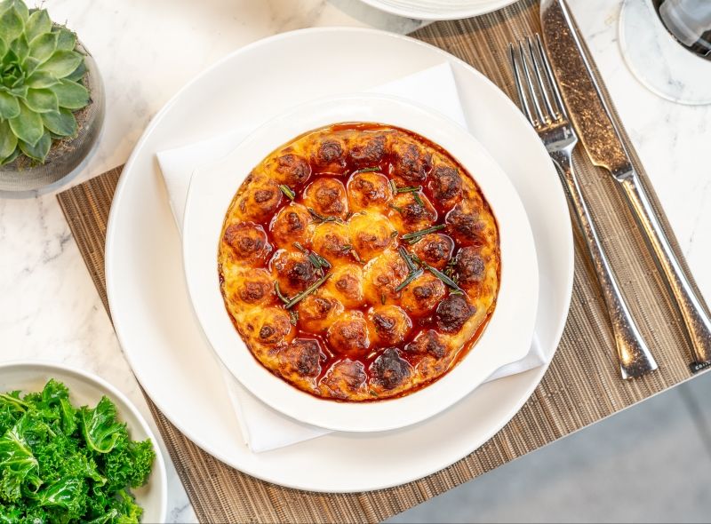 Origin Kensington, a modern British restaurant at Royal Garden Hotel, offering signature dishes such as Shepherd's Pie.